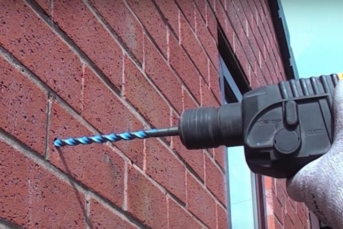 Use a tiny drill bit to weaken the concrete first